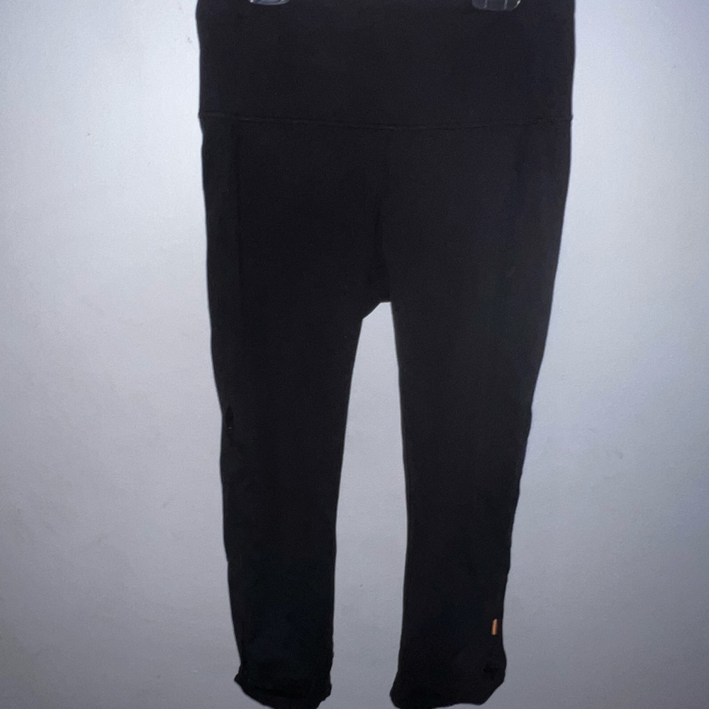 Black Lucy Capri’s sz medium, leg cutouts.